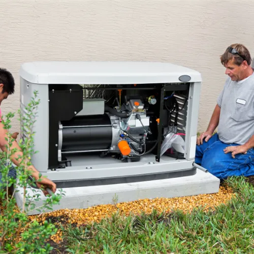 Technician working on generator